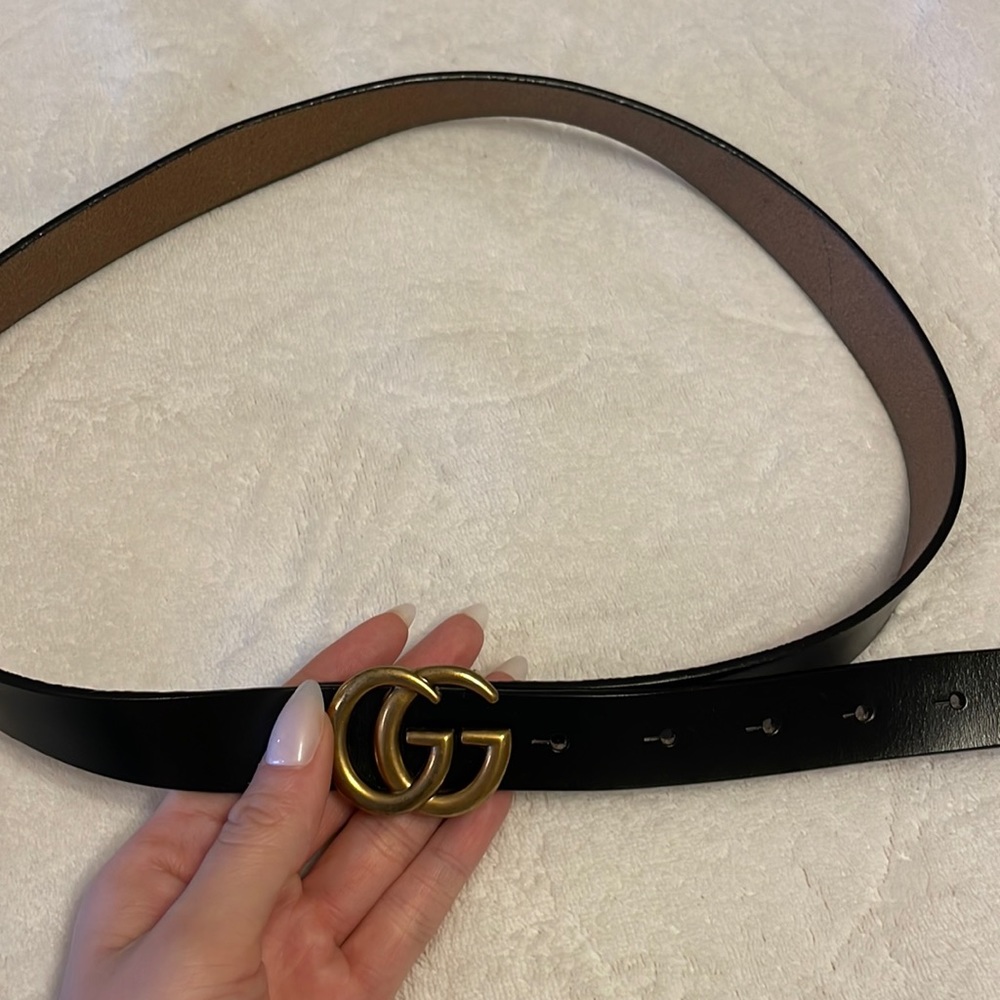 Gucci belt. Black and gold